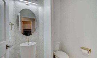 Bathroom photo with a mirror on wall